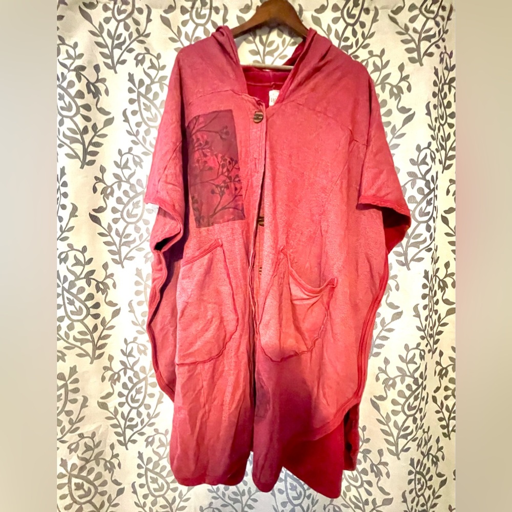 Blue Fish brand short sleeve hooded sweatshirt. Button down with front pockets.